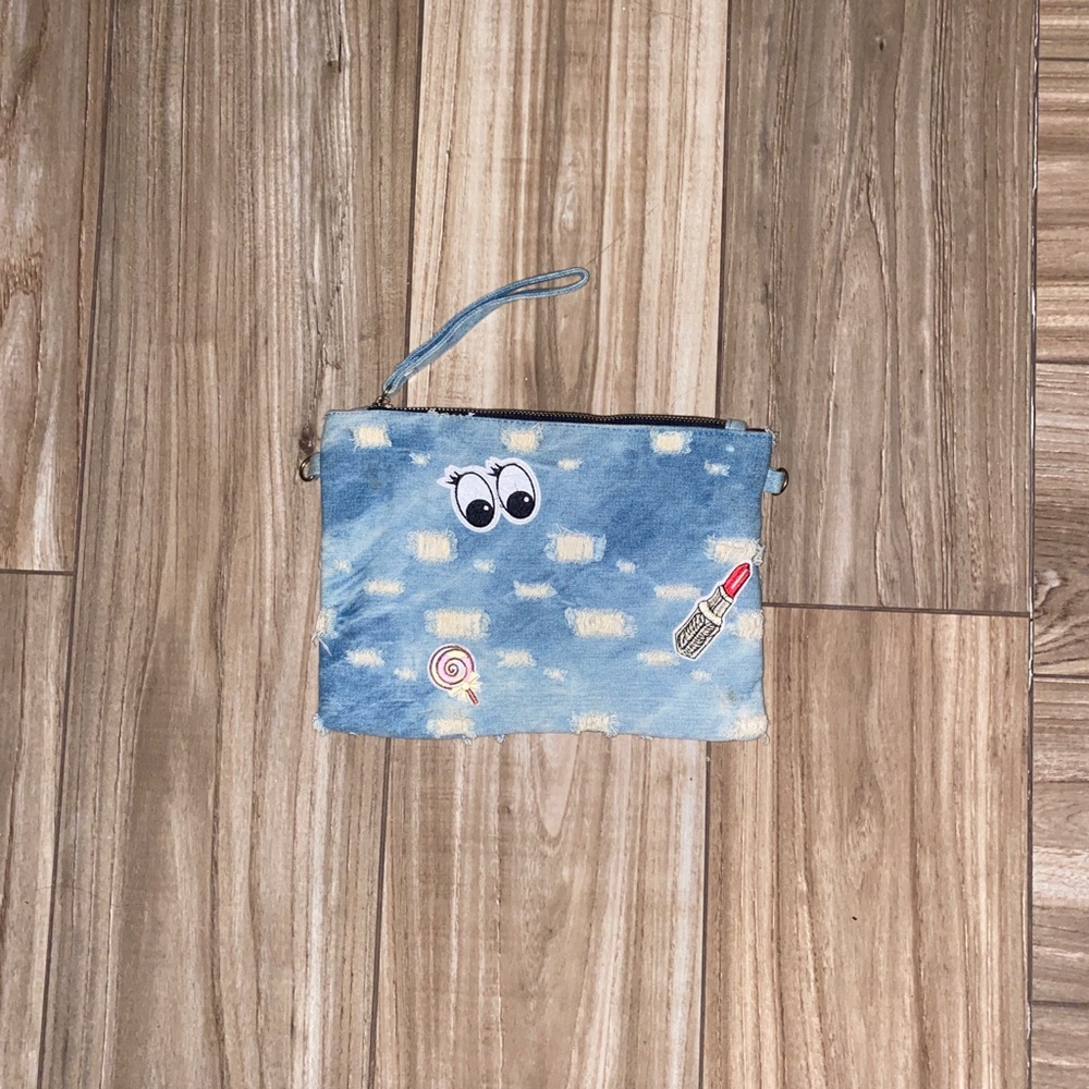 Denim patched clutch